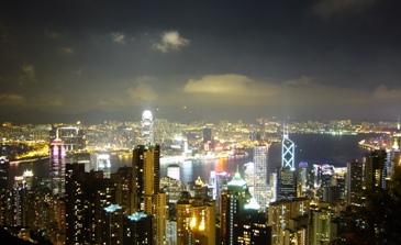 This photo of Hong Kong and Hong Kong Harbor at night (from the Peak) was taken by Natasha Lai from New York City.
